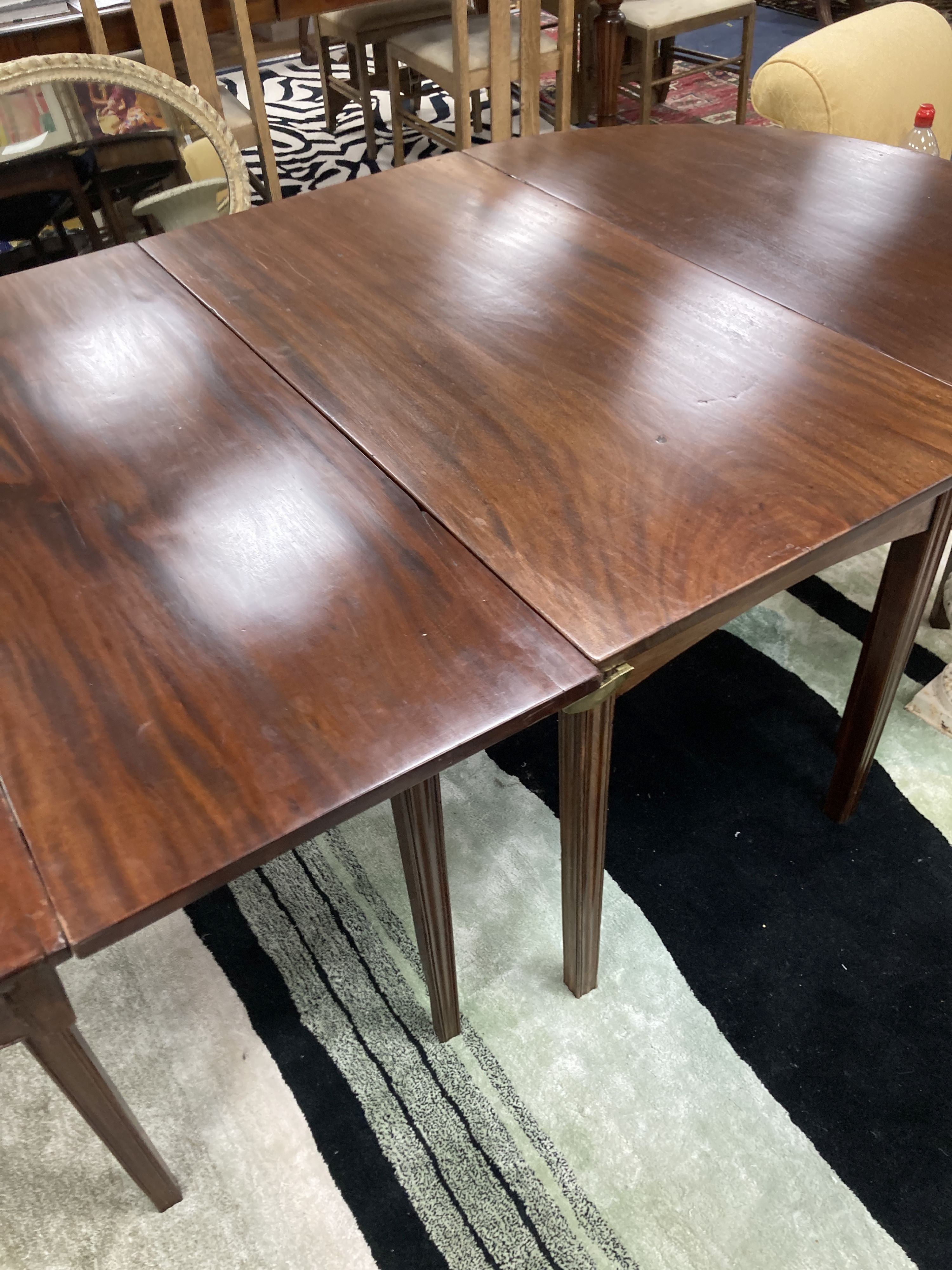 A George III mahogany D end extending dining table. 220cm extended. W-118, H-71cm.